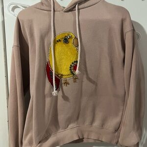 Beige Hoodie with Colorful Parrot Design
